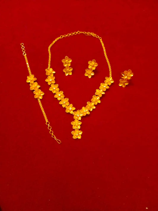 Ensemble plaqué or motif fleur tropical